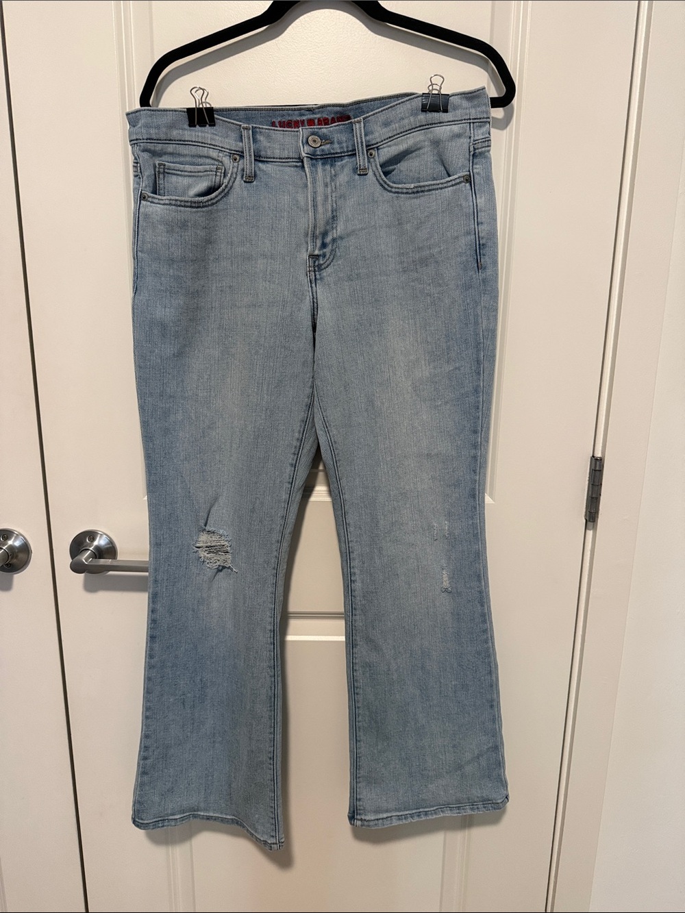 Lucky Brand Light Blue Flare Jeans with Knee Distress